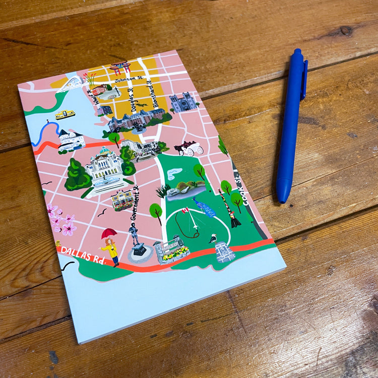 handmade notebook / journal with illustrated cover.