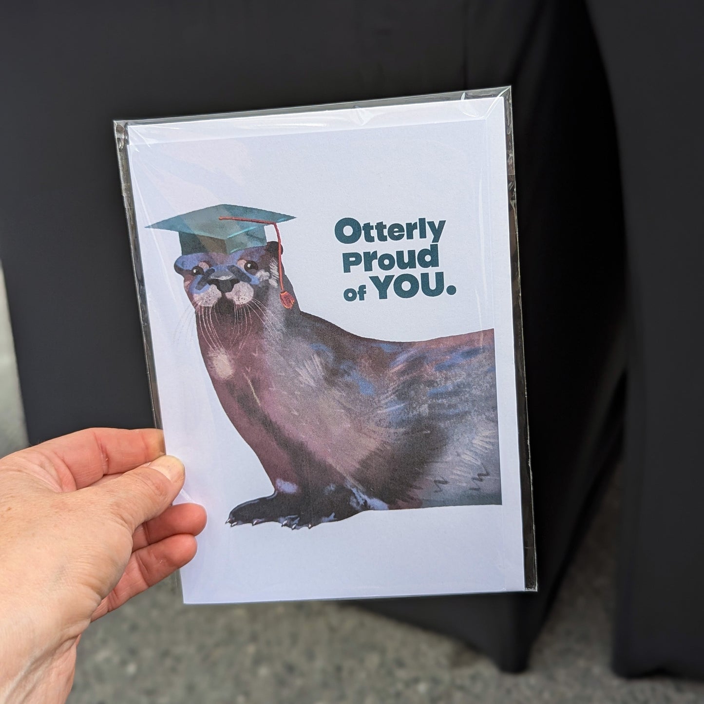 Otterly Proud of You graduation card with otter illustration in a cap
