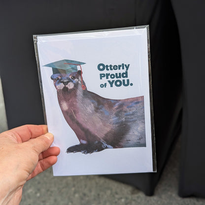 Otterly Proud of You graduation card with otter illustration in a cap