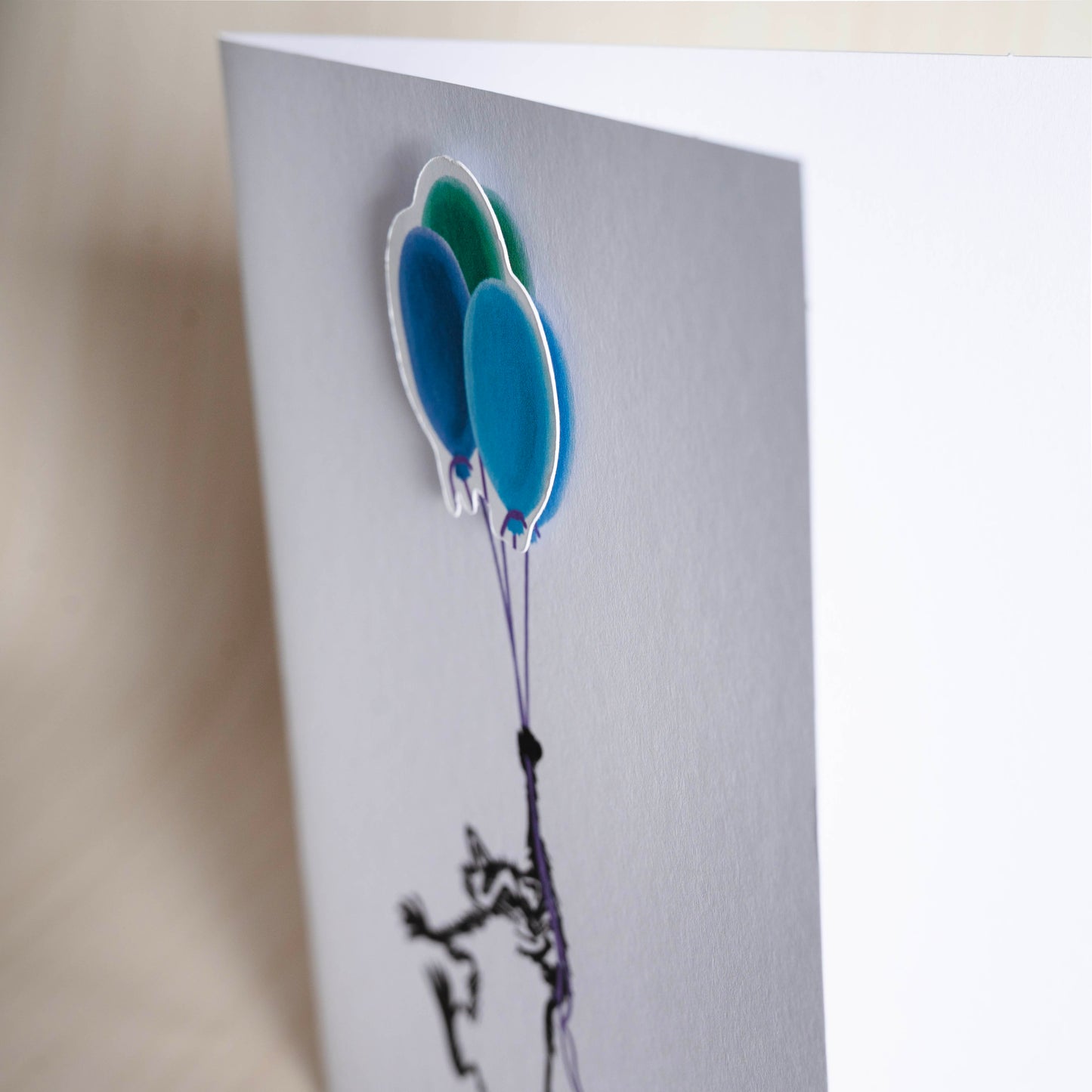 Raccoon Holding Balloons - Card